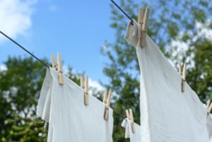 How to Create Your Own Outdoor Laundry System Using Graywater and Natural Fiber Clotheslines